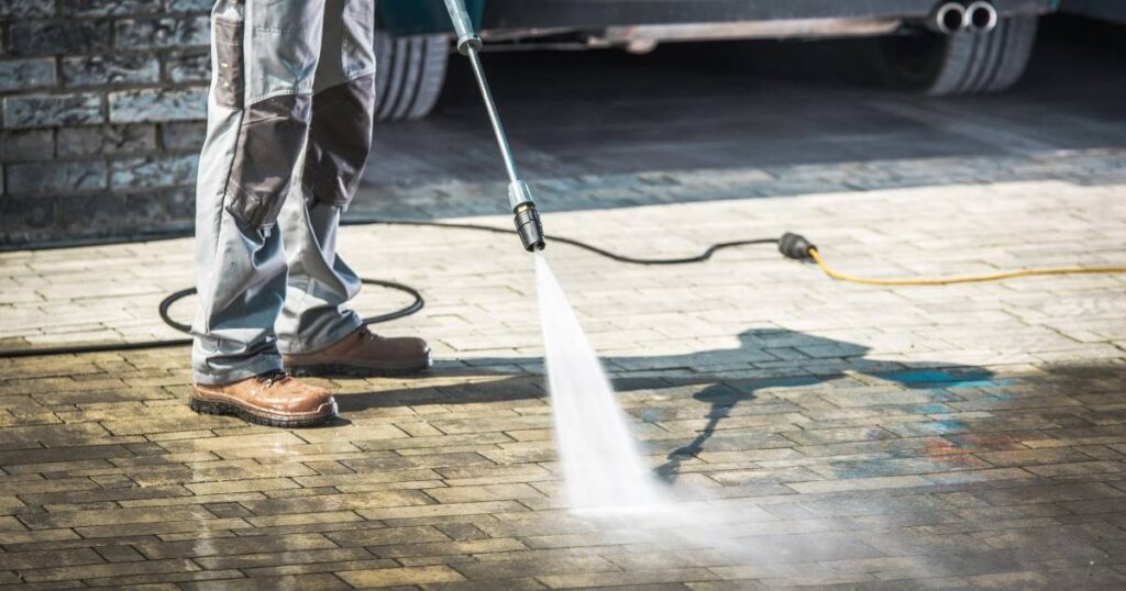 Power Washing Removing Concrete Sealer